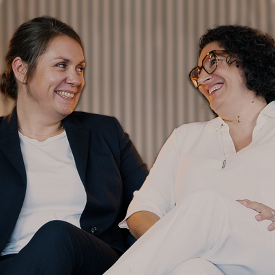 Elodie Crocilla and Morgane Allain laughing together.