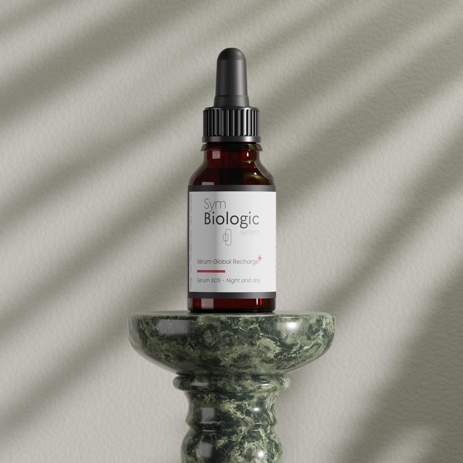 Image of Global Recharge serum on a stone display stand