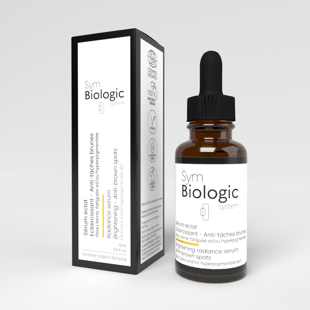 Radiance Serum - Brightening - Anti-Brown Spots in a 15ml glass dropper bottle with its box on a white background, targeting skin radiance and reducing brown spots.
